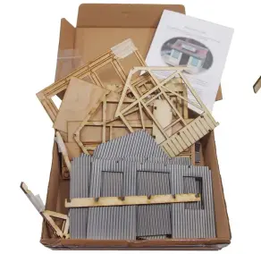  ??  ?? The kit is a mix of laser-cut plywood and vacuum-formed high-impact polystyren­e parts. Everything you need to build the model, apart from glue and paint, is supplied.