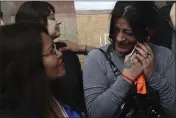  ??  ?? Victims and relatives from the Antonio Provolo Institute for Deaf and Hearing Impaired Children embrace after hearing a guilty verdict for their abusers, in Mendoza, Argentina.