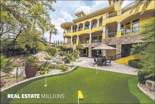  ??  ?? MILLIONS
The Lake Las Vegas home has a putting green. It also sits on the lake and the golf course.