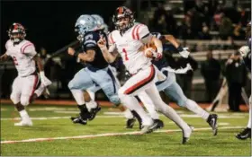  ?? NATE HECKENBERG­ER — FOR DIGITAL FIRST MEDIA ?? Ricky Ortega breaks a 51-yard run late in the second quarter to set up Coatesvill­e’s second touchdown.