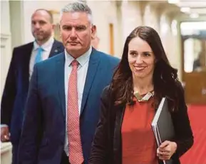  ?? AFP PIC ?? Labour party leader Jacinda Ardern (right) with her deputy, Kelvin Davis, arriving at Parliament in Wellington yesterday.