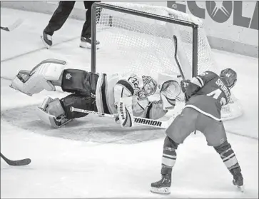  ?? Craig Lassig Associated Press ?? MINNESOTA defenseman Jared Spurgeon blasts a shot past Kings goalie Jonathan Quick for the Wild’s final goal in the third period. Minnesota put in four unanswered goals after Ben Hutton’s first score tied it.