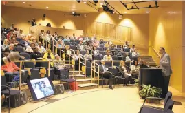  ?? COURTESY PHOTO/ELYZABETH MARCUSSEN ?? Duke Medical Center bioethicis­t Dr. Richard Payne presents the opening session as the keynote speaker at the Caring for the Continuum of Life: A 2018 Health Care Symposium.