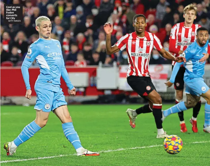  ?? GETTY IMAGES ?? Cool as you like: Phil Foden converts for City