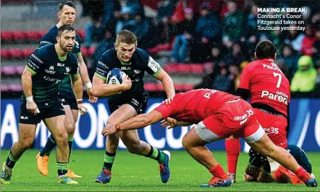  ??  ?? MAKING A BREAK: Connacht’s Conor Fitzgerald takes on Toulouse yesterday