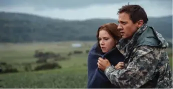  ?? JAN THIJS ?? Amy Adams as Louise Banks and Jeremy Renner as Ian Donnelly in Arrival, directed by Canadian Denis Villeneuve.