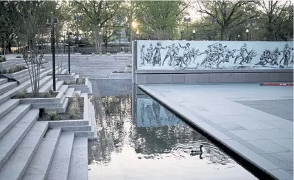  ?? T.J. Kirkpatric­k, © The New York Times Co. ?? Constructi­on at the site of the World War I Memorial in Washington on Tuesday. The design, restoratio­n of Pershing Park and constructi­on of the new memorial will cost $42 million.