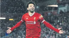  ?? AFP ?? Mohamed Salah celebrates scoring Liverpool’s fourth goal at Anfield.