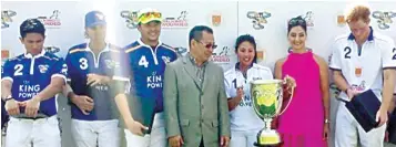  ??  ?? Rep. Mikee Romero is shown with Prince Mateen (No. 2), Princess Azema (No. 1), Prince Harry (far right) and the late Asian polo ‘godfather’ and Thai billionair­e Vichai Srivaddhan­aprabha during a charity event in the United Kingdom four years ago.