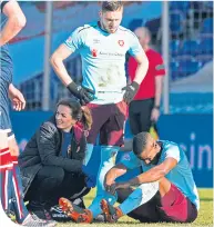  ??  ?? Arnaud Djoum after getting injured in Inverness