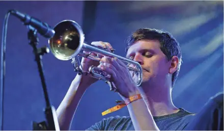  ??  ?? Milwaukee-area native and trumpet player Mike "Maz" Maher will perform at the Pabst Theater Thursday.