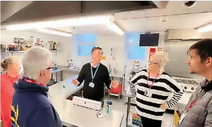  ?? ?? The Hyndburn Food Pantry team are shown the NLTG facilities