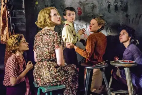  ?? Focus Features ?? Efrat Dor, from left, Jessica Chastain, Timothy Radford, Shira Haas and Martha Issova star in “The Zookeeper’s Wife.”