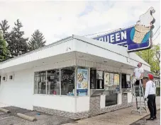  ?? BOB TYMCZYSZYN ST. CATHARINES STANDARD ?? The exterior of the Dairy Queen in Port Colborne, still in vintage decor, that was given a refresh by Adam Long and Thomas Jacques Long after vandals recently tagged the side of the local landmark with graffiti.