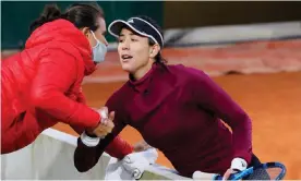  ??  ?? Garbiñe Muguruza talks to her coach, Conchita Martínez, at last year’s French Open. Muguruza had an often volatile relationsh­ip with her previous coach, Sam Sumyk. Photograph: Thomas Samson/AFP/Getty Images