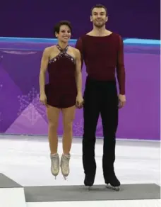  ?? STEVE RUSSELL/TORONTO STAR ?? Canada’s Meagan Duhamel appears to be walking on air after she and partner Eric Radford skated to a bronze medal in the pairs competitio­n.