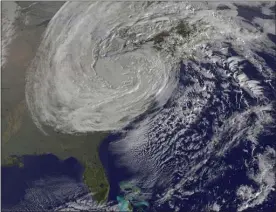  ?? NASA GOES PROJECT ?? Satellite imagery of Superstorm Sandy rotating over central Pennsylvan­ia after making landfall. The sheer size of the storm can be seen as clouds stretch from Atlanta to Canada.