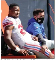 ??  ?? New York Giants running back Saquon Barkley is carted to the locker room after being injured during the first half Sunday against the Chicago Bears. Barkley tore the anterior cruciate ligament in his right knee and will miss the rest of the season. (AP/Nam Y. Huh)