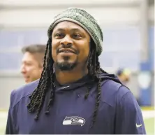  ?? Ted S. Warren / Associated Press ?? Former running back Marshawn Lynch, seen here with the Seahawks, is excited to join the Roots’ ownership group.