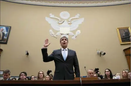  ?? J. SCOTT APPLEWHITE — THE ASSOCIATED PRESS ?? Michael Cohen, President Donald Trump’s former personal lawyer, is sworn in to testify before the House Oversight and Reform Committee on Capitol Hill in Washington, Wednesday.