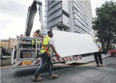  ?? AFP ?? Cladding removed from Braithwait­e House in London last year after the Grenfell fire. All of the samples failed safety tests