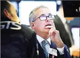  ??  ?? Specialist Anthony Rinaldi works on the floor of the
New York Stock Exchange, Tuesday, Oct 8, 2019. Stocks opened lower on Wall Street as tensions rose between Washington and Beijing just ahead of the latest round of trade talks. (AP)