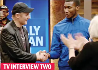  ??  ?? Handshake: Neeson with a member of the audience on Live With Kelly And Ryan TV INTERVIEW TWO