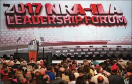  ?? SCOTT OLSON/ GETTY IMAGES ?? President Donald Trump speaks at the NRA-ILA’s Leadership Forum at the 146th NRA Annual Meetings and Exhibits on Friday in Atlanta. Trump is the first president to address the annual meetings since Ronald Reagan.