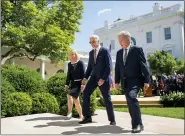  ?? ANDREW HARNIK — THE ASSOCIATED PRESS ?? President Joe Biden departs with Swedish Prime Minister Magdalena Andersson, left, and Finnish President Sauli Niinisto, right, after speaking in the Rose Garden at the White House in Washington, Thursday, May 19.