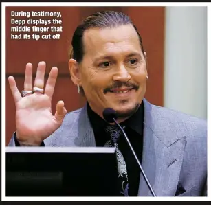  ?? ?? During testimony, Depp displays the middle finger that had its tip cut off