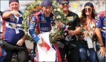  ?? CHRIS GRAYTHEN, GETTY IMAGES ?? Takuma Sato of Japan, driver of the #26 Andretti Autosport Honda, celebrates after winning the 101st Indianapol­is 500.