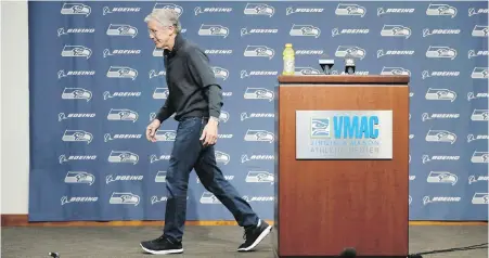 ??  ?? Disappoint­ed Seahawks head coach Pete Carroll leaves the podium last week after his end-of-season news conference in Seattle.