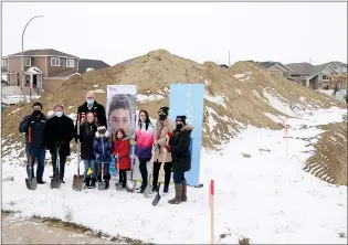  ?? NEWS PHOTO COLLIN GALLANT ?? Dignitarie­s and future homeowners gather at the site of the new Habitat for Humanity building project in the south-end community of Southlands on Friday morning.