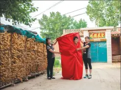  ??  ?? Several Liyu villagers practise a trick in the village in the Taihang Mountains.