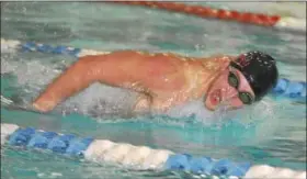  ??  ?? Boyertown’s Patrick Lance swims the 100-meter butterfly against Phoenixvil­le in a PAC dual on Feb. 7.