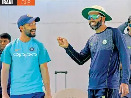  ?? — PTI ?? Ajinkya Rahane and Wasim Jaffer.