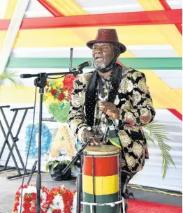  ?? ?? As he did at last week’s service for Bunny Diamond, Bongo Herman drummed up some great vibes.