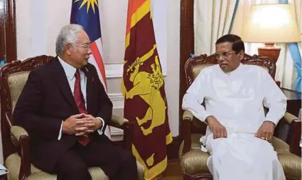  ?? BERNAMA PIC ?? Prime Minister Datuk Seri Najib Razak with Sri Lankan President Maithripal­a Sirisena at the Presidenti­al Secretaria­t Building in Colombo on Monday.