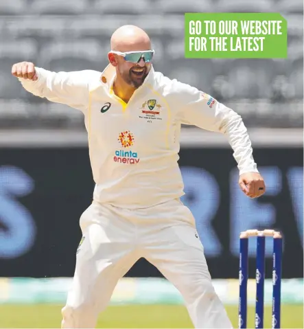  ?? Picture: Getty ?? Australian spinner Nathan Lyon celebrates after taking the wicket of Kraigg Braithwait­e in Perth.