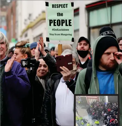  ??  ?? BATTLE LINES: The protest on Grafton St, right, turned ugly after a firework was set off in the crowd last weekend