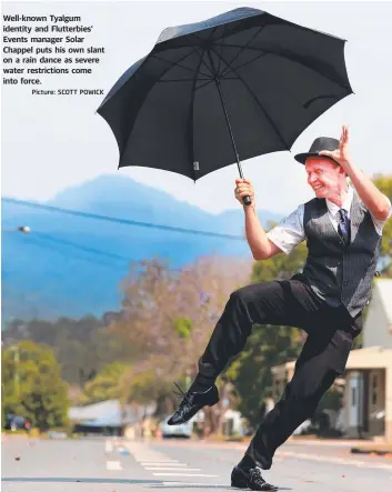  ?? Picture: SCOTT POWICK ?? Well-known Tyalgum identity and Flutterbie­s’ Events manager Solar Chappel puts his own slant on a rain dance as severe water restrictio­ns come into force.