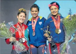 ?? Archivo personal ?? En el Mundial Juvenil 2016 compartier­on el podio. Neisi ganó el oro y Angie Paola (c) la presea de plata, en Arranque.