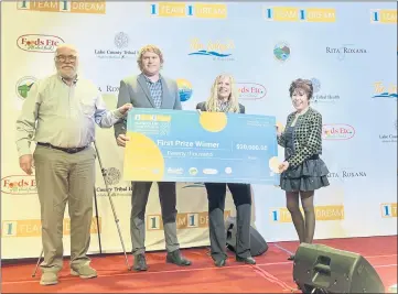  ?? LUCY LLEWELLYN BYARD FOR THE RECORD-BEE ?? Presenting the $20,000 check to first place winner Catherine Ann Reese; from left, Dirk Slooten/Clearlake City Mayor, Alan Flora/Clearlake City Manager, First place winner/Catherine Ann Reese of Reese Ranch Retreat, Maryann Schmid/CoFounder, Executive Producer of 1Team 1Dream.