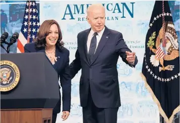  ?? CHIP SOMODEVILL­A/GETTY ?? President Joe Biden and Vice President Kamala Harris appear during an event with nine families benefiting from the new child tax credit at the Eisenhower Executive Office Building on Thursday.
