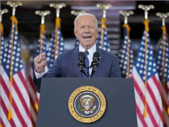  ?? Associated Press ?? President Joe Biden delivers a speech Wednesday on infrastruc­ture spending at Carpenters Pittsburgh Training Center in Collier.