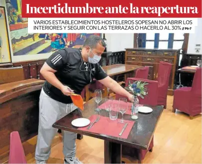  ?? Foto: Iñaki Porto ?? Preparativ­os en el restaurant­e Aralar ante la entrada en vigor mañana de la nueva normativa.