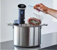  ?? Handouts via New York Times ?? With products like the Anova Precision Cooker, sous vide cookers are better and more affordable than ever.