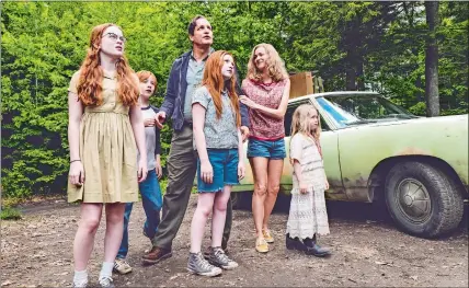  ?? JAKE GILES NETTER/LIONSGATE VIA AP ?? Max Greenfield, left, and Brie Larson are featured in “The Glass Castle.” From left, Sadie Sink, Charlie Shotwell, Ella Anderson, foreground center, Woody Harrelson, Naomi Watts and Eden Grace Redfield star in “The Glass Castle.”