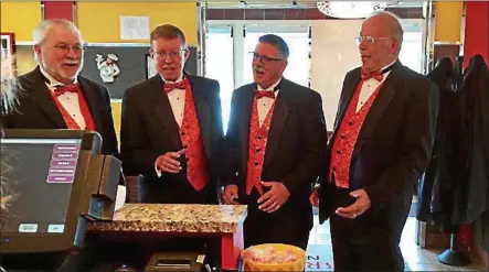  ?? PHOTO PROVIDED ?? A barbershop quartet delivers a Singing Valentine on Valentine’s Day as a fundraiser for The Racing City Chorus.