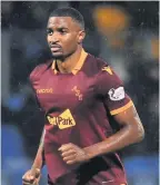  ??  ?? SINGLED OUT Two Hearts fans racially abused Motherwell’s Christian Mbulu